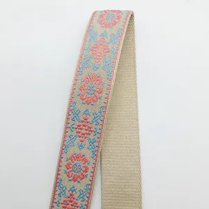 Detail view of ethnic embroidered strap showing front and back texture contrast