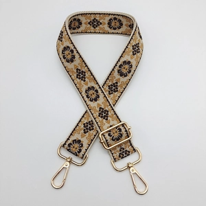 Ethnic style embroidered bag strap with golden floral pattern and adjustable metal buckle