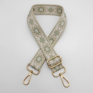 Ethnic embroidered woven shoulder strap with floral pattern and golden metal hardware hooks