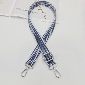 Adjustable blue and white geometric canvas shoulder strap with silver metal lobster clasps