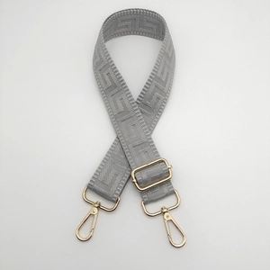 Adjustable grey Greek Key pattern canvas shoulder strap with gold metal hooks