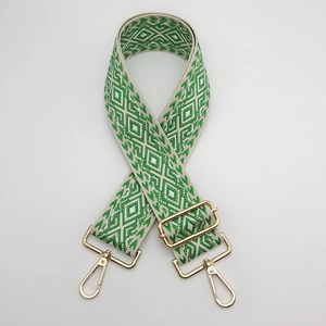 Adjustable green and white geometric rhombus pattern woven strap with gold metal hooks