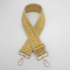 Adjustable nylon bag strap with yellow geometric diamond pattern and gold hardware