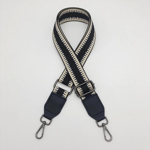 Adjustable black and white geometric canvas bag strap with gunmetal swivel hooks