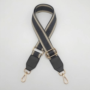 Adjustable woven canvas bag strap with chevron pattern and golden metal swivel hooks