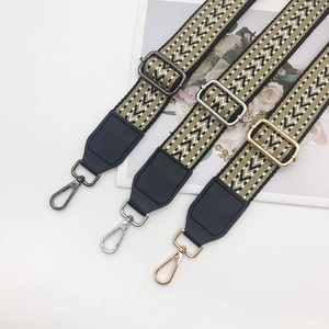 Adjustable nylon shoulder strap with chevron pattern and three metal hook finishes