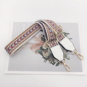 Adjustable nylon shoulder strap with colorful ethnic geometric patterns and gold hooks