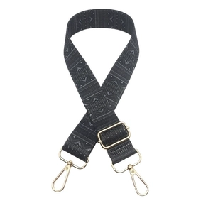 Ethnic geometric pattern nylon bag strap with gold metal hardware on white background
