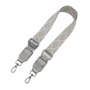 Adjustable geometric patterned bag strap with silver metal buckles and swivel snap hooks
