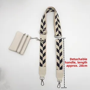 Detachable 28cm black and white chevron strap with small beige zipper pouch and silver hooks