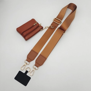 Adjustable brown nylon crossbody phone strap with leather pouch and gold hardware