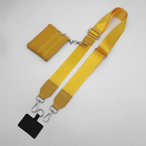 Detail of adjustable yellow nylon phone strap with integrated leather zipper coin pouch