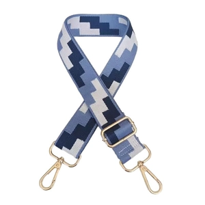 Adjustable canvas shoulder strap with blue geometric pattern and gold swivel hooks