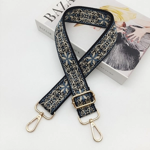 Ethnic style colorful jacquard wide bag strap with golden metal hardware on white background