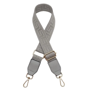 Adjustable light gray woven handbag strap with geometric patterns and gold metal hooks