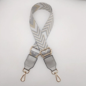 Adjustable geometric woven canvas shoulder strap with vintage wave pattern and gold hooks