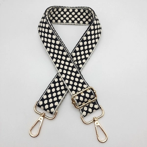 Tracolla regolabile in cotone-poliestere con motivo jacquard geometrico bianco e nero