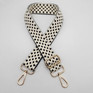 Tracolla di ricambio regolabile con motivo jacquard geometrico nero e bianco elegante
