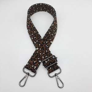 Adjustable leopard print shoulder strap for bags with gunmetal grey metal hardware buckles