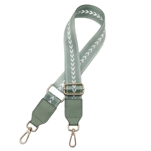 Bandoulière réglable en nylon vert sauge avec motif flèches et fermoirs dorés en métal