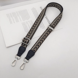 Adjustable woven shoulder strap for crossbody bags with silver metal hooks and leather ends
