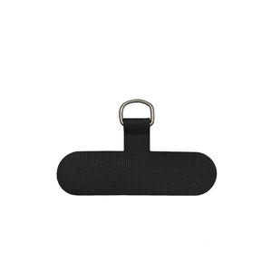 Detail of black T-shaped nylon phone strap connector pad with silver metal D-ring