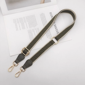 Adjustable wide woven bag strap with geometric patterns and gold metal clasps