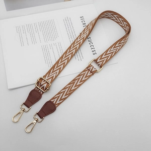 Adjustable brown and beige herringbone woven strap with gold metal buckles for mini handbags
