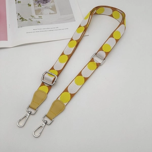 Adjustable wide replacement shoulder strap with yellow polka dots and silver metal hooks