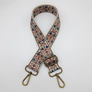 Adjustable wide ethnic embroidered bag strap with vintage floral pattern and bronze hooks