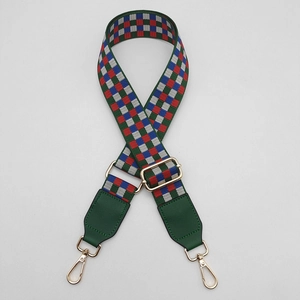 Adjustable colorful woven wide shoulder strap with green leather ends and gold metal clips