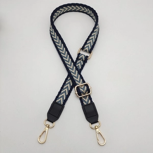 Adjustable retro woven crossbody strap with blue chevron pattern and gold metal hooks