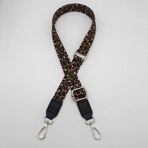 Adjustable leopard print bag strap with PU leather ends and silver metal hooks