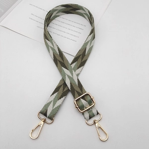 Adjustable wide replacement shoulder strap with green geometric chevron pattern and gold clips