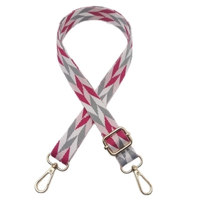Adjustable woven shoulder strap for bags with pink V-pattern and gold hardware