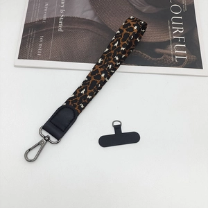 Leopard print braided phone wrist strap with metal hook and black connection patch