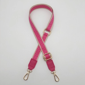 Adjustable rose red jacquard shoulder strap with golden metal lobster clasps and leather ends