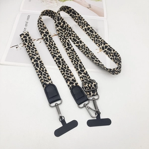 Detailed set of leopard print phone lanyards including long strap and wristlet with hooks