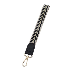 Leaf pattern woven phone lanyard with golden metal hook and cream white strap