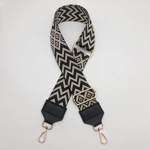 Detail of adjustable 5cm wide shoulder strap with black and white geometric pattern