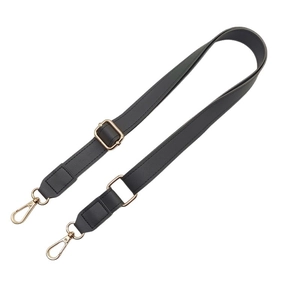 Adjustable black PU leather bag strap with gold metal hooks on white background