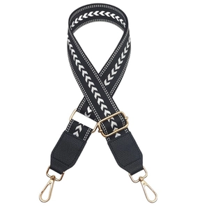 Adjustable black and white woven wide strap with gold hardware and leather ends