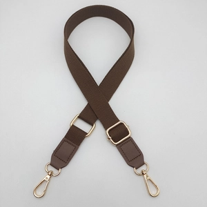 Adjustable dark brown cotton shoulder strap with golden metal lobster clasps for handbags