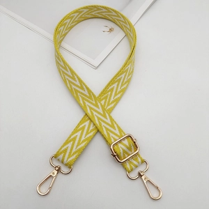 Tracolla regolabile con motivo chevron giallo e bianco e moschettoni in metallo dorato