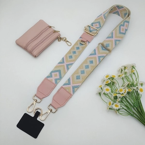 Bohemian geometric crossbody strap with pink leather wallet and gold metal clips