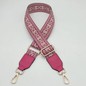 Adjustable wide woven shoulder strap for handbags in rose pink with gold metal hardware