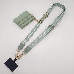 Adjustable green phone strap with detachable coin purse and metal hooks for crossbody use