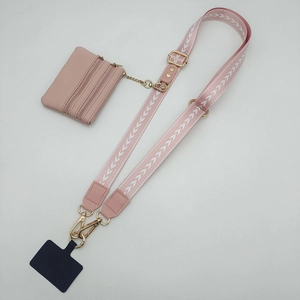 Pink adjustable phone strap with geometric pattern and matching three-layer leather coin purse