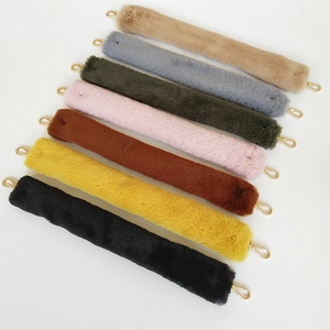 Detail of plush faux fur replacement bag straps with gold metal lobster clasps in seven colors