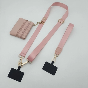 Roze nylon crossbody telefoonkoord set inclusief klein portemonneetje en gouden sluiting